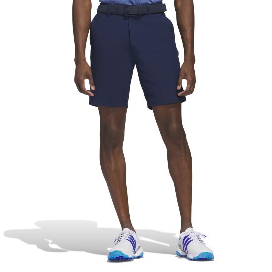 Model wearing adidas Men's Ultimate 365 Navy Golf Shorts