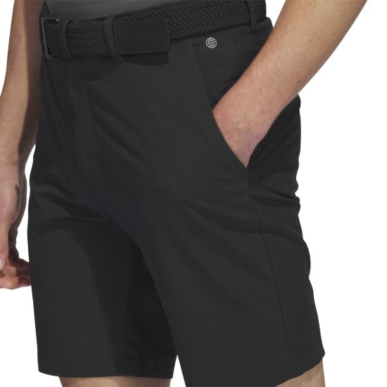 Model wearing adidas Men's Ultimate 365 Black Golf Shorts Side View