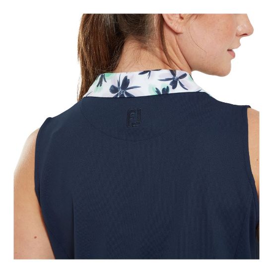 Model wearing FootJoy Ladies Floral Trim Navy Golf Dress Back View