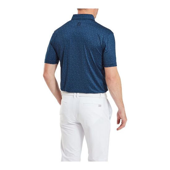 Model wearing FootJoy Men's Painted Floral Lisle Navy Golf Polo Shirt Back View