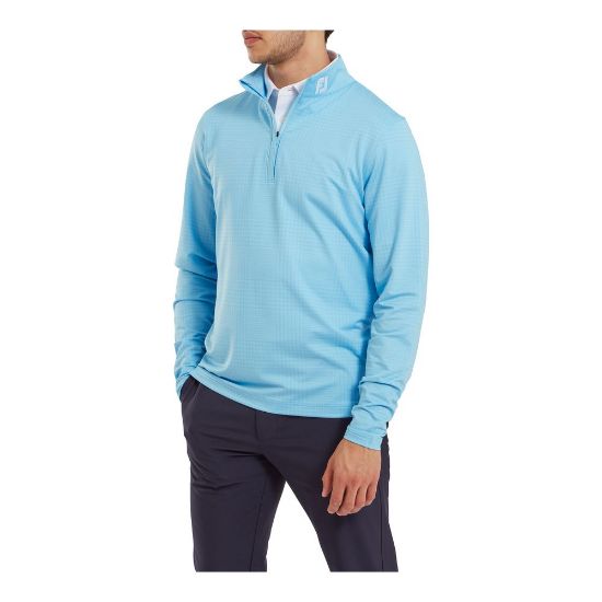 Model wearing FootJoy Men's Glen Plaid Print Chill-Out Blue Sky Golf Pullover