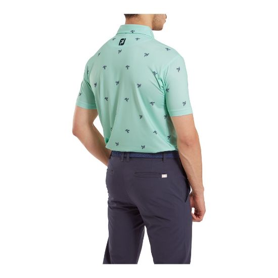 Model wearing FootJoy Men's Thistle Print Lisle Sea Glass Golf Polo Shirt Back View