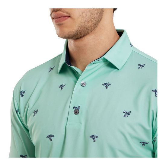 Model wearing FootJoy Men's Thistle Print Lisle Sea Glass Golf Polo Shirt Front