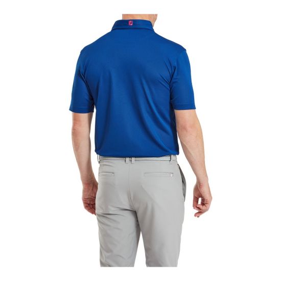 Model wearing FootJoy Men's Stretch Pique Solid Deep Blue Golf Polo Shirt Back View