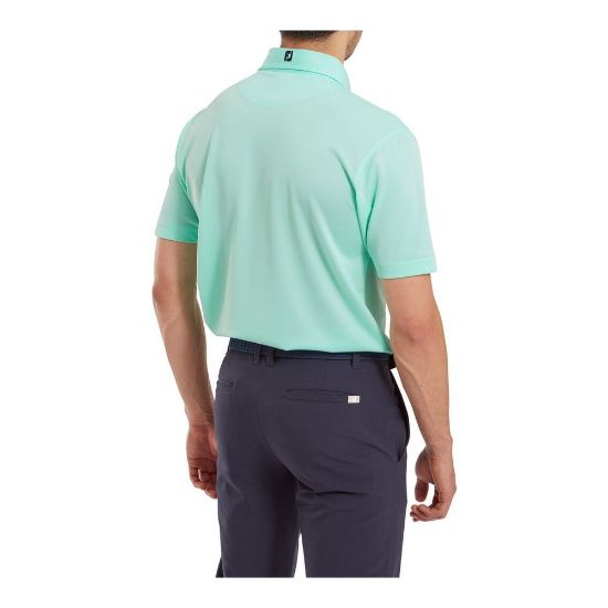Model wearing FootJoy Men's Stretch Pique Solid Sea Glass Golf Polo Shirt Back View