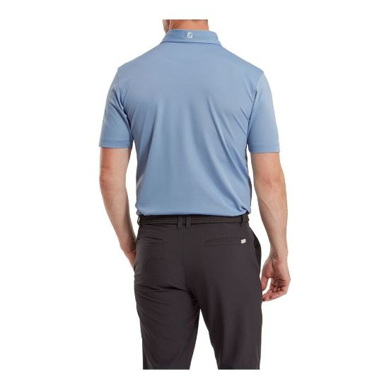 Model wearing FootJoy Men's Stretch Pique Solid Storm Golf Polo Shirt Back View