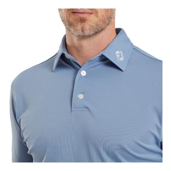 Model wearing FootJoy Men's Stretch Pique Solid Storm Golf Polo Shirt Front