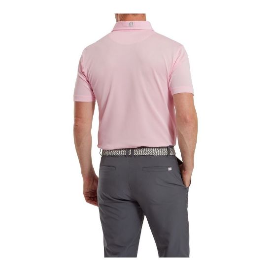 Model wearing FootJoy Men's Stretch Pique Solid Light Pink Golf Polo Shirt Back