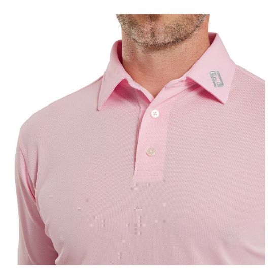 Model wearing FootJoy Men's Stretch Pique Solid Light Pink Golf Polo Shirt Front View