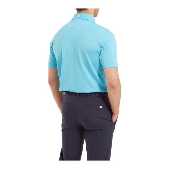 Model wearing FootJoy Men's Stretch Pique Solid Riviera Blue Golf Polo Shirt Back