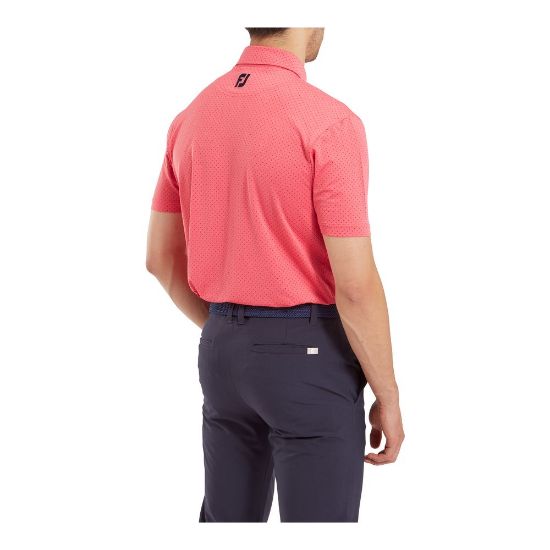 Model wearing FootJoy Men's Stretch Lisle Dot Print Coral Red/Navy Golf Polo Shirt Back View