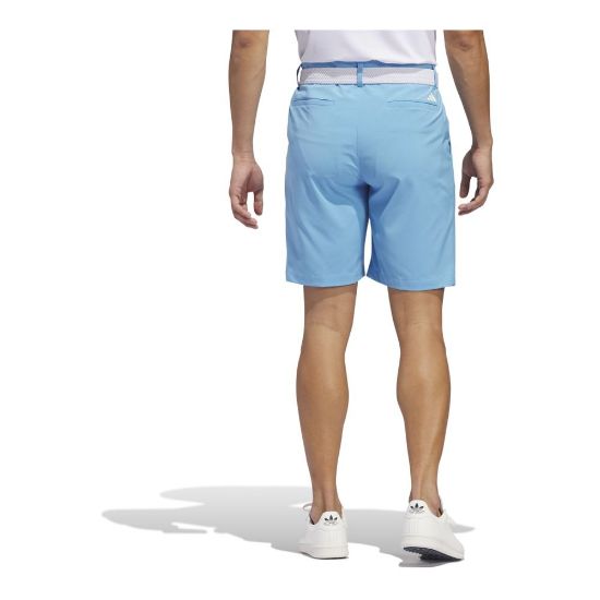 Model wearing adidas Men's Ultimate 365 Semi Blue Burst Golf Shorts Back View