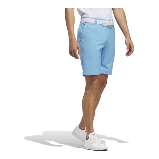 Model wearing adidas Men's Ultimate 365 Semi Blue Burst Golf Shorts Side View