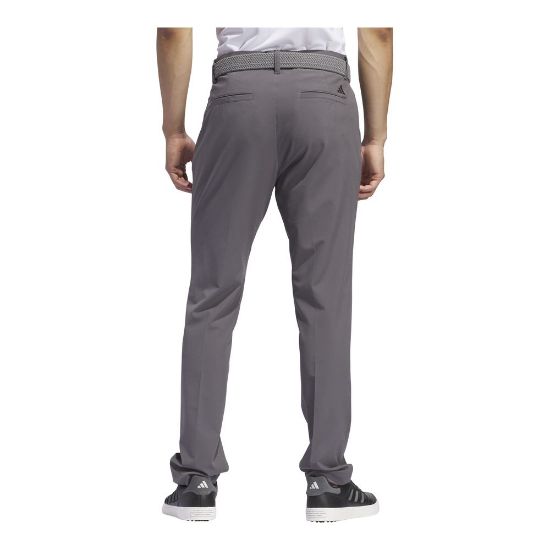  Model wearing adidas Men's Ultimate 365 Tapered Grey Five Golf Pants Back View