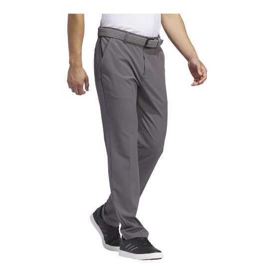  Model wearing adidas Men's Ultimate 365 Tapered Grey Five Golf Pants Side View