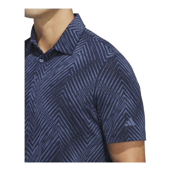 Model wearing adidas Men's Ultimate 365 Allover Print Navy Golf Polo Shirt Side View