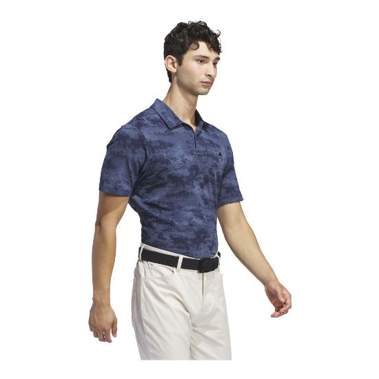 Model wearing adidas Men's Go To Print Mesh Collegiate Navy Golf Polo Side View