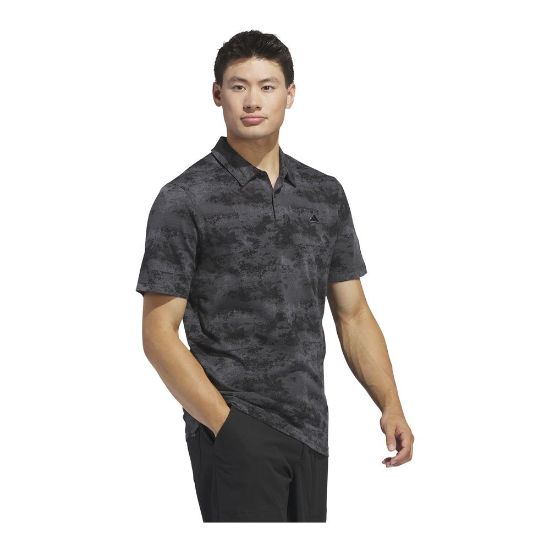 Model wearing adidas Men's Go To Print Mesh Black Golf Polo Shirt Side View