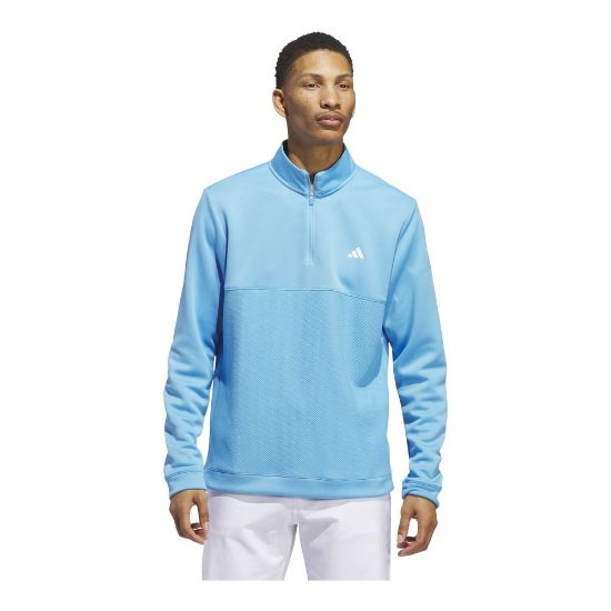 Model wearing adidas Men's Textured Semi Burst Blue Golf Mid Layer