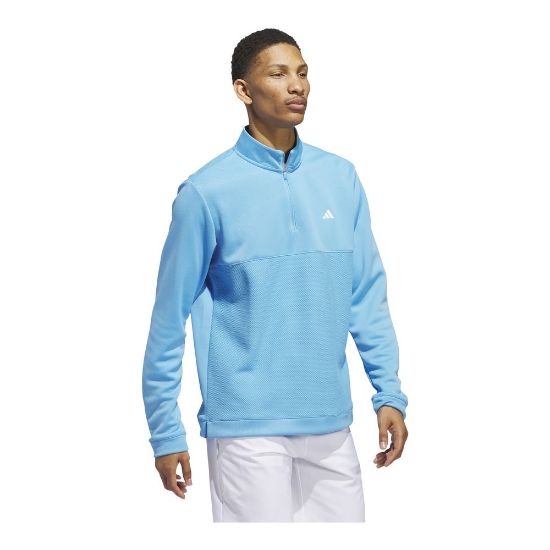 Model wearing adidas Men's Textured Semi Burst Blue Golf Mid Layer  Side View