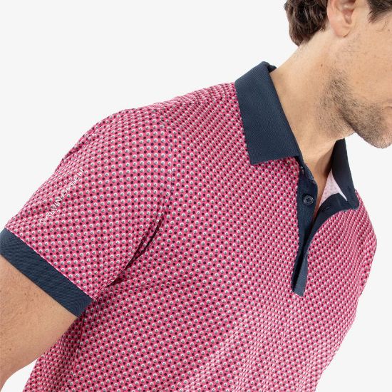 Model wearing Galvin Green Men's Mate V8+ Camellia Rose Golf Polo Shirt Side View