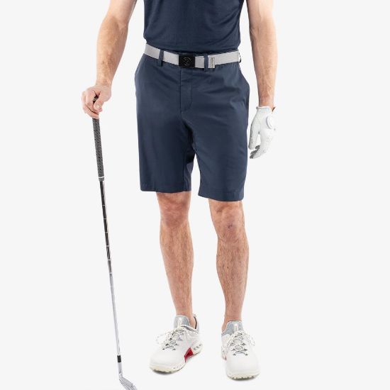 Model wearing Galvin Green Men's Percy V8+ Navy Golf Shorts