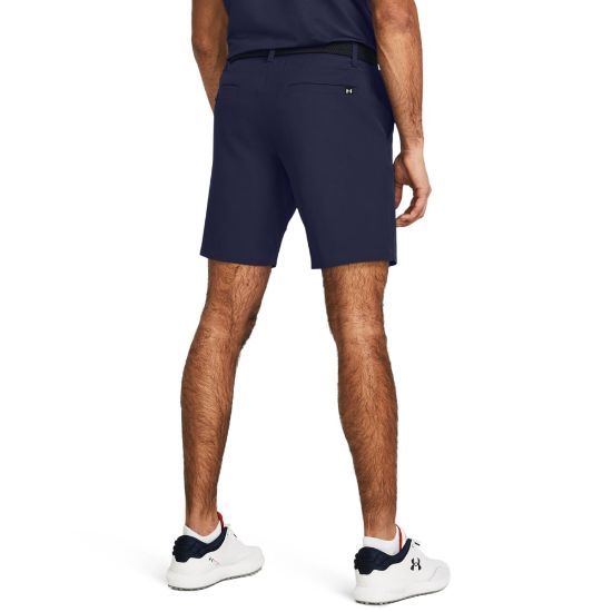Model wearing Under Armour Men's Drive Taper Midnight Navy Golf Shorts Back View