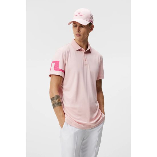 Model wearing J.Lindeberg Men's Heath Regular Fit Pink Golf Polo Shirt