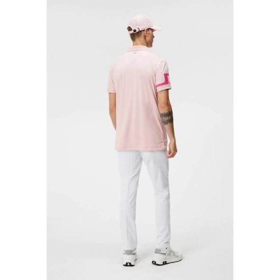 Model wearing J.Lindeberg Men's Heath Regular Fit Pink Golf Polo Shirt Back View