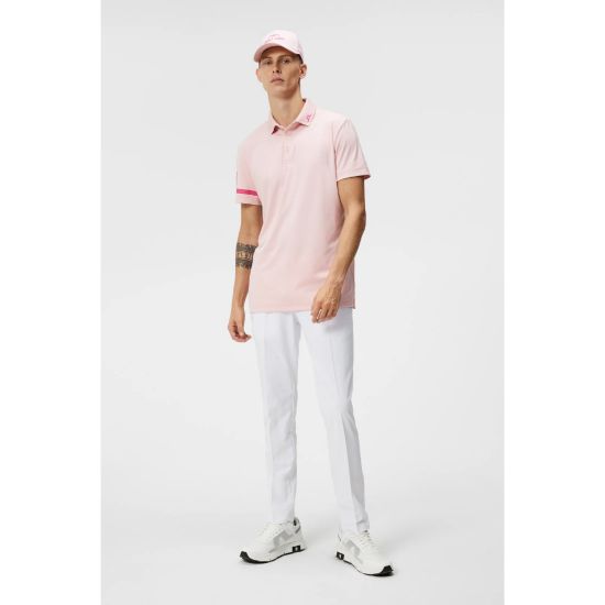 Model wearing J.Lindeberg Men's Heath Regular Fit Pink Golf Polo Shirt Full View