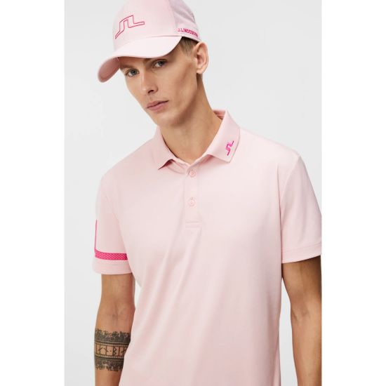 Model wearing J.Lindeberg Men's Heath Regular Fit Pink Golf Polo Shirt Front