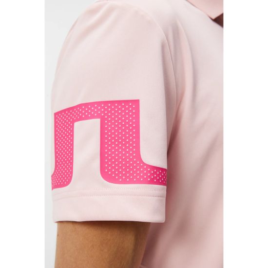 Model wearing J.Lindeberg Men's Heath Regular Fit Pink Golf Polo Shirt Side