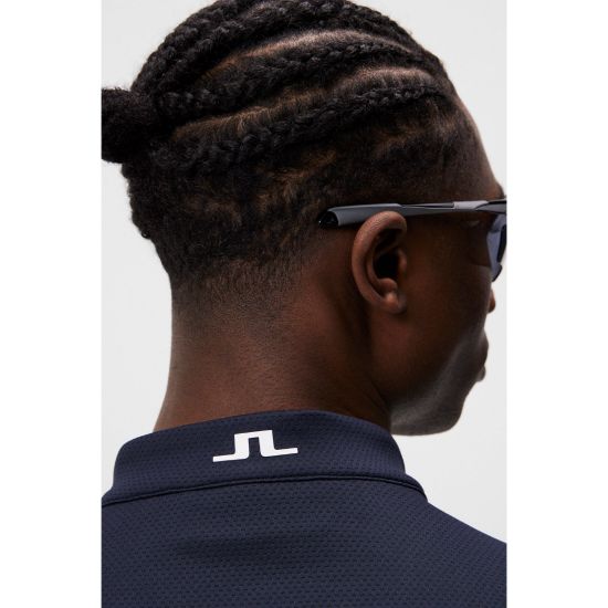 Model wearing J.Lindeberg Men's Klas Regular Fit JL Navy Golf Polo Shirt Back View