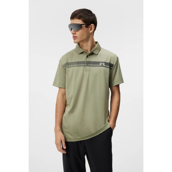 Model wearing J.Lindeberg Men's Klas Regular Fit Oil Green Golf Polo Shirt