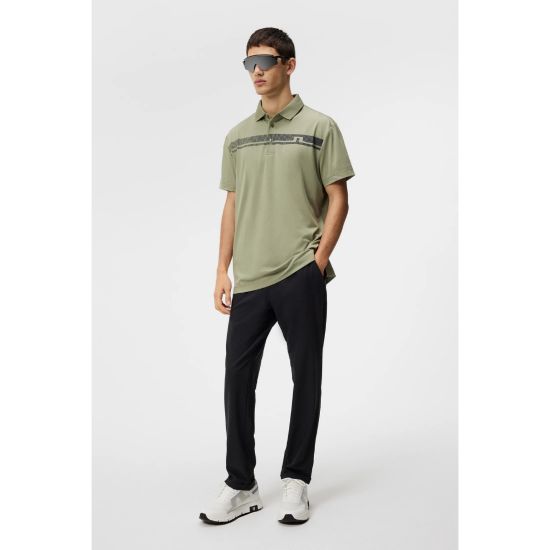 Model wearing J.Lindeberg Men's Klas Regular Fit Oil Green Golf Polo Shirt Full View