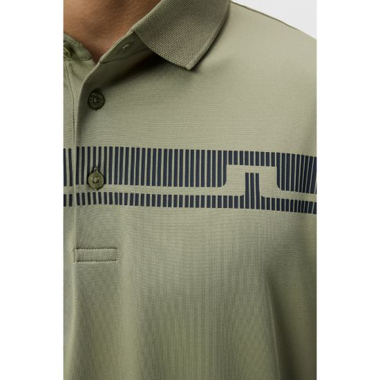 Model wearing J.Lindeberg Men's Klas Regular Fit Oil Green Golf Polo Shirt Side View