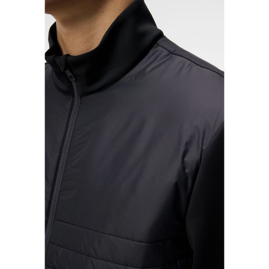 Model wearing J.Lindeberg Men's Martino Quilt Hybrid Black Golf Jacket Front