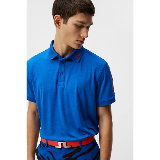Model wearing J.Lindeberg Men's Tour Tech Nautical Blue Melange Golf Polo Shirt Front