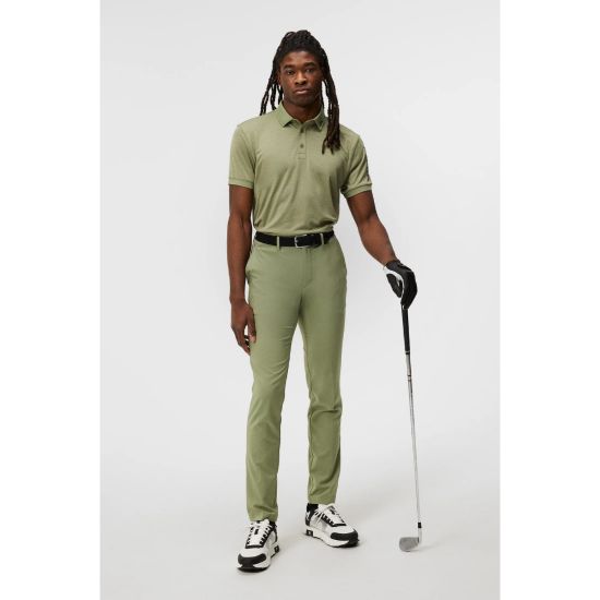 Model wearing J.Lindeberg Men's Tour Tech Oil Green Melange Golf Polo Shirt Full View