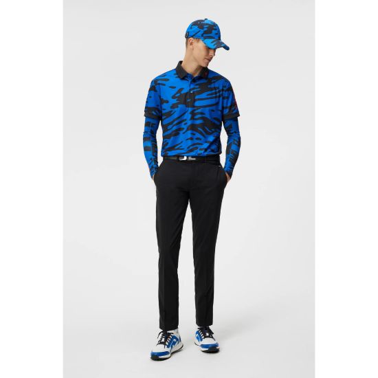 Model wearing J.Lindeberg Men's Tour Tech Print Blue Golf Polo Shirt Full View