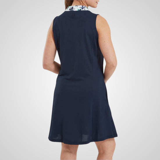 Model wearing FootJoy Ladies Floral Trim Navy Golf Dress Back View View