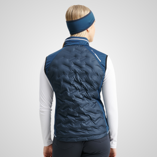 Model wearing Abacus Ladies Grove Hybrid Golf Vest Rear View Peacock Blue