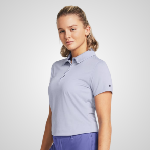 Model wearing Under Armour Ladies Playoff Celeste Golf Polo Shirt Front View