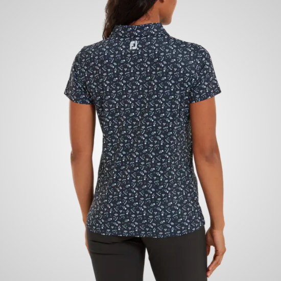 Model wearing FootJoy Ladies Floral Print Lisle Navy Golf Polo Shirt Back View