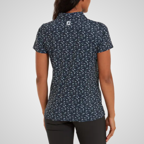 Model wearing FootJoy Ladies Floral Print Lisle Navy/White Golf Polo Shirt Back View