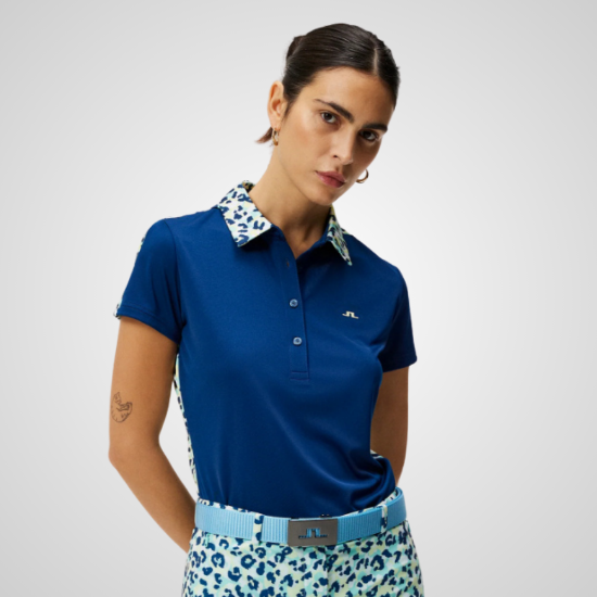 Model wearing J.Lindeberg Ladies Cara Blue Golf Polo Shirt Front View
