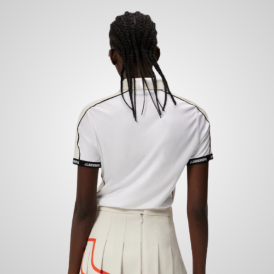 Model wearing J.Lindeberg Ladies Demi White Golf Polo Shirt Back View