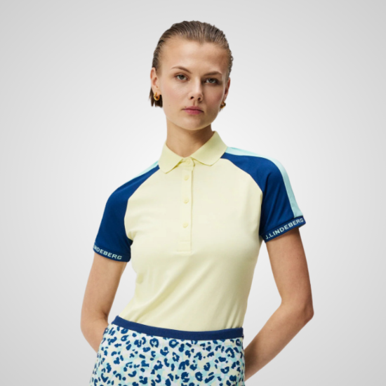 Model wearing J.Lindeberg Ladies Perinne Yellow Golf Polo Shirt Front View