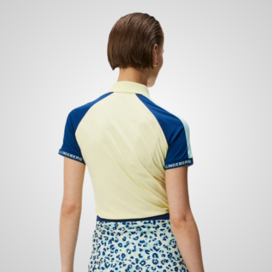 Model wearing J.Lindeberg Ladies Perinne Wax Yellow Golf Polo Shirt Back View