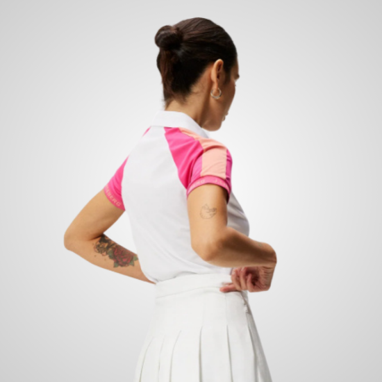 Model wearing  J.Lindeberg Ladies Perinne Fuschia Purple Golf Polo Shirt Back View